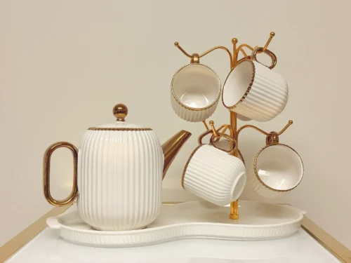 8-Piece Ribbed Ceramic Tea Set with Gold Trim - Teapot, 6 Cups & Tray