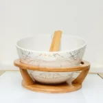 ceramic salad bowl with bamboo stand and servers