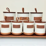 rustic ceramic kitchen canister set with wooden lids and tray