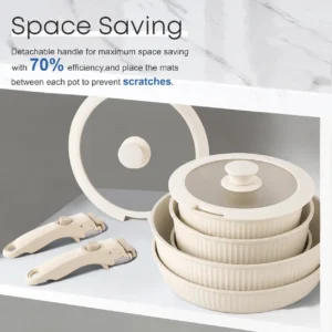 cream-detachable-handle-cookware-nested-storage Cream detachable-handle cookware nested for storage with two removable handles beside it.