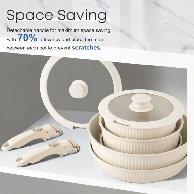 cream-detachable-handle-cookware-nested-storage Cream detachable-handle cookware nested for storage with two removable handles beside it.